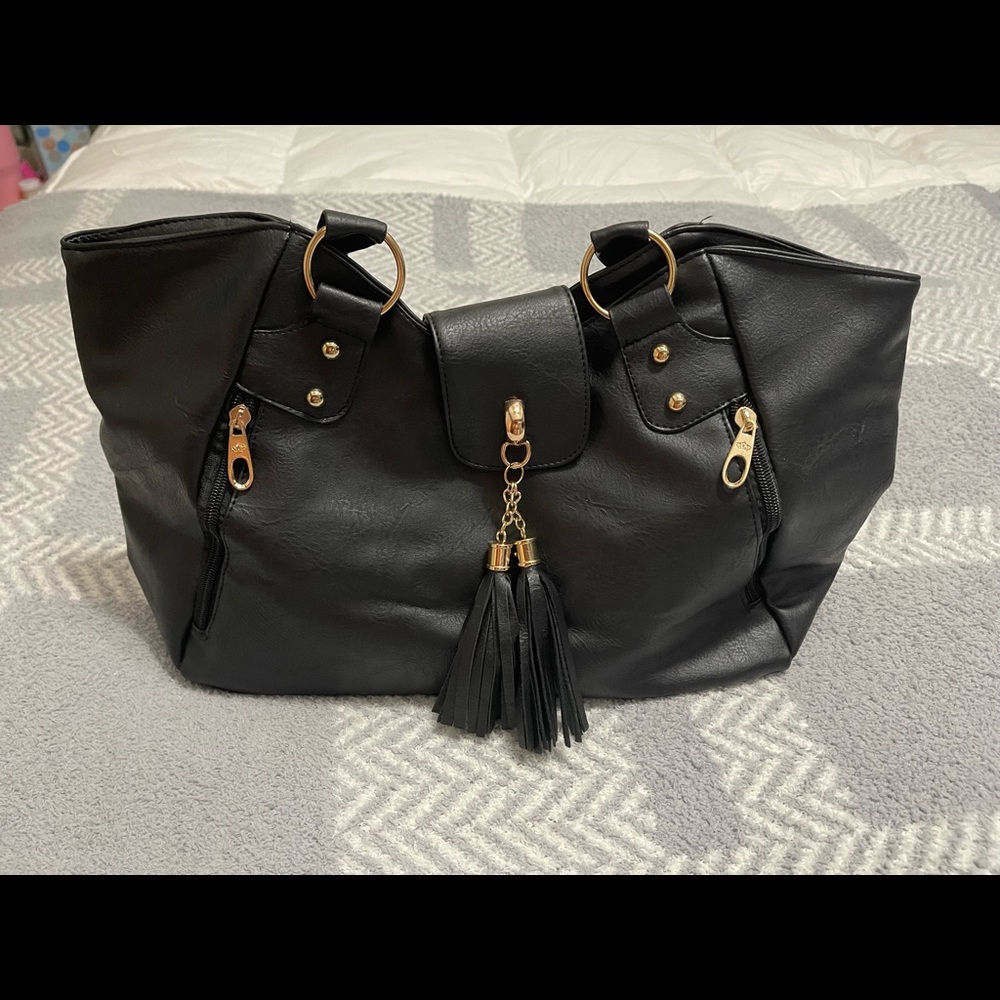 Black NWOT vegan leather handbag with tassel